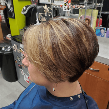 A customer with a blonde ombre haircut