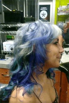 A customer with a blue ombre haircut