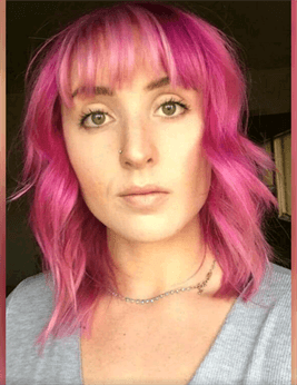 A customer with a pink haircut