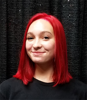 A customer with a red haircut